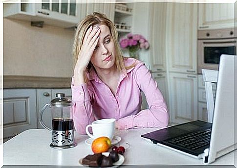 Woman hanging over the kitchen table