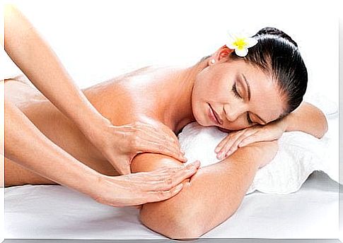 Woman getting massage - toned arms