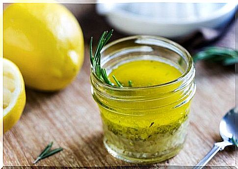 Glass of lemon and olive oil