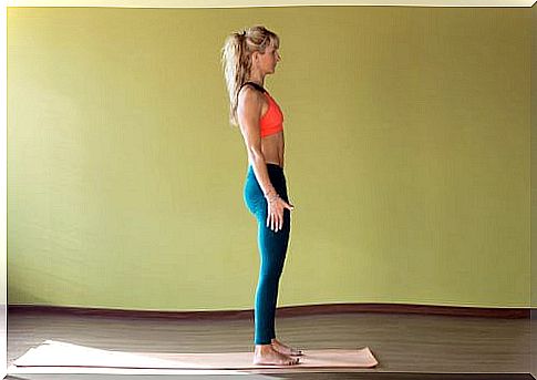 Woman standing with good posture.