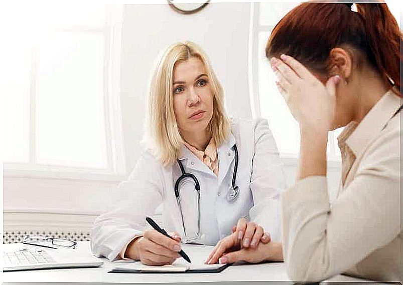 A woman who is upset when she talks to her doctor