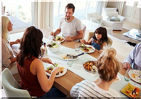 Family eating dinner together