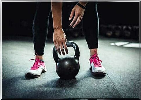 Person with kettleball