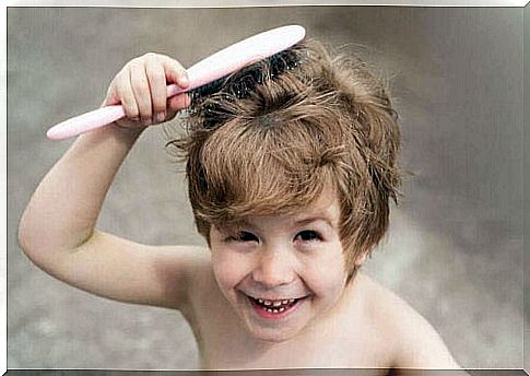 Child brushes his hair