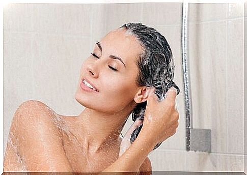 Woman washes her hair