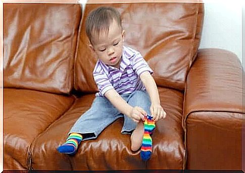 Development of motor skills: A child wearing socks