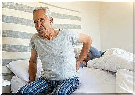 Man trying to get a good night's sleep as part of treating osteoarthritis